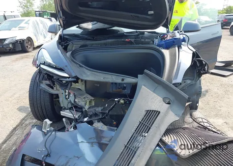 2023 Tesla Model Y from USA, damaged, VIN 7SAYGDEE0PA129376